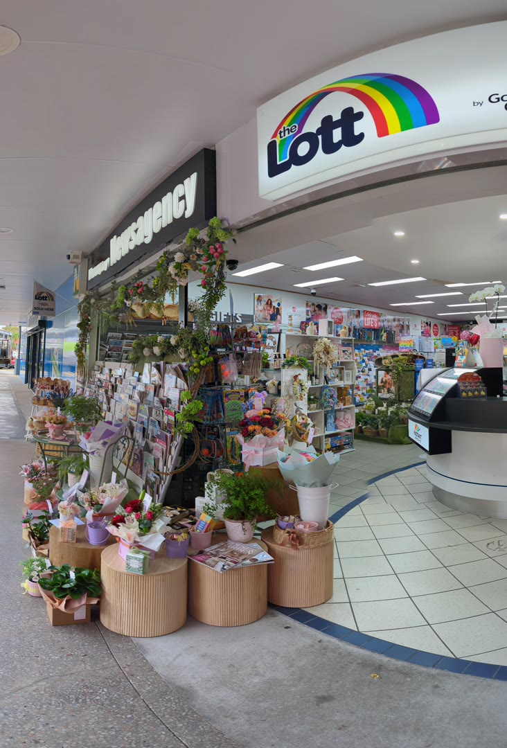 The entrance to Worongary News, with flowers, gifts and the counter inside